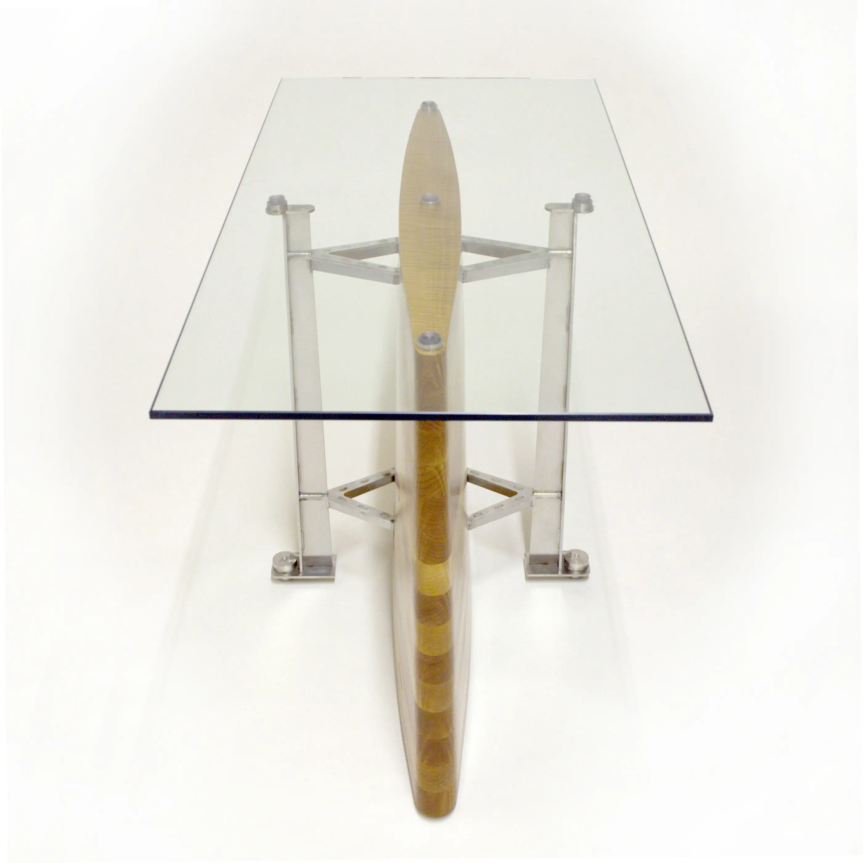 Erosion Table with transparent glass top, sculptural wooden centerpiece and stainless steel supports