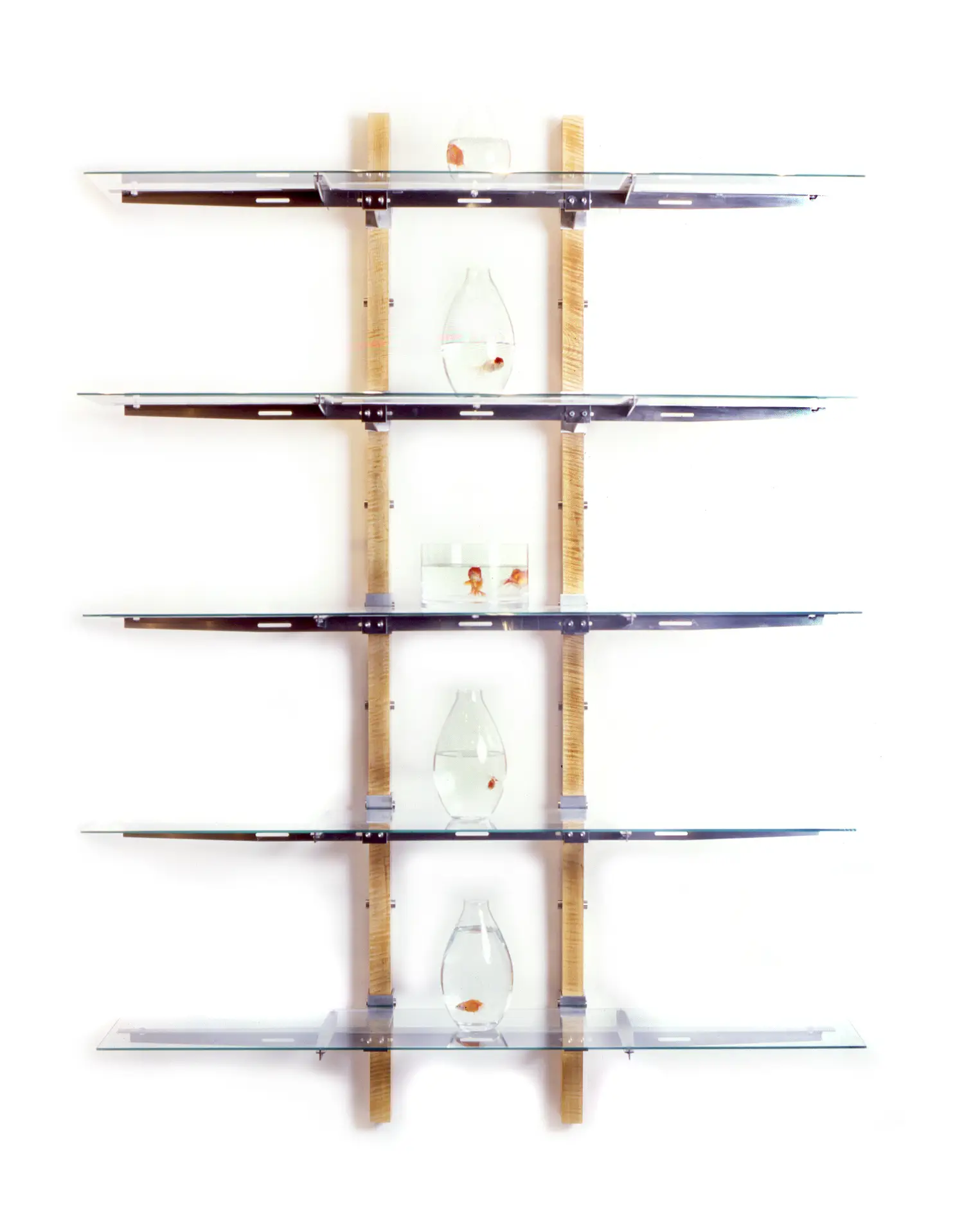 Grace Shelf wall-mounted shelving system with slender wooden arms and glass display shelves