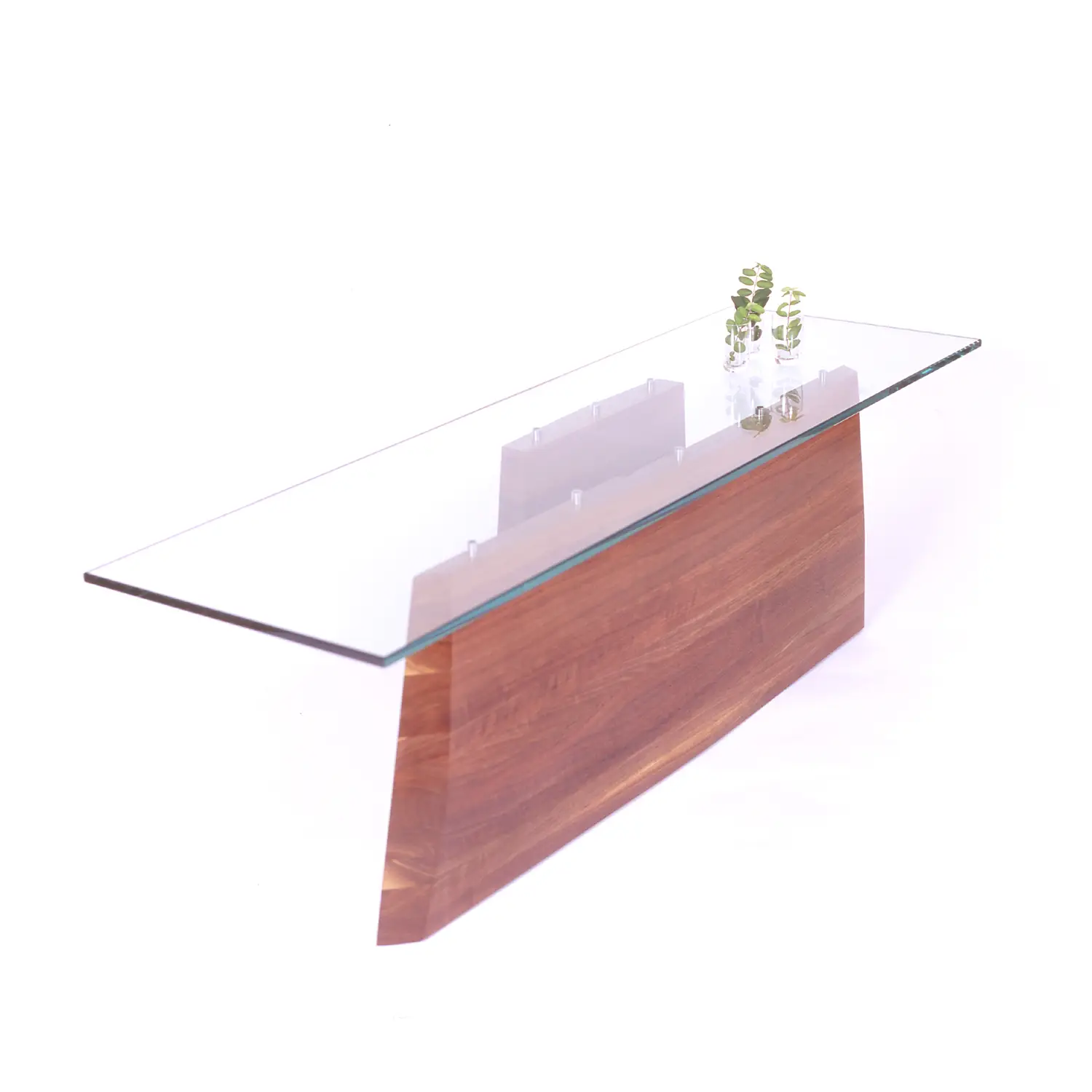 Angled view of the Hansen Table highlighting its flowing sculptural shape and natural wood grain.