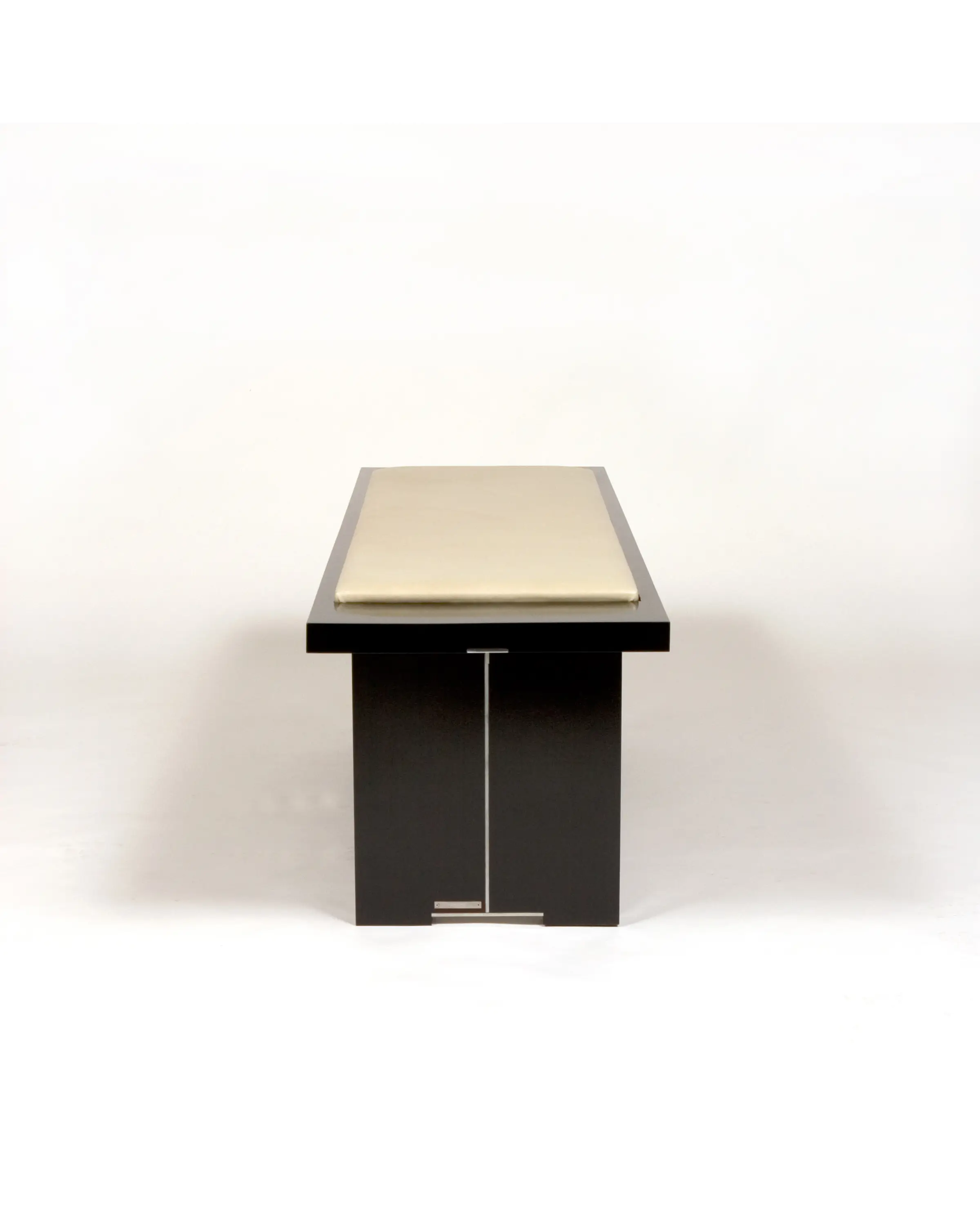 Hisashiburi Bench showing the relationship between the wooden legs and recessed steel structure