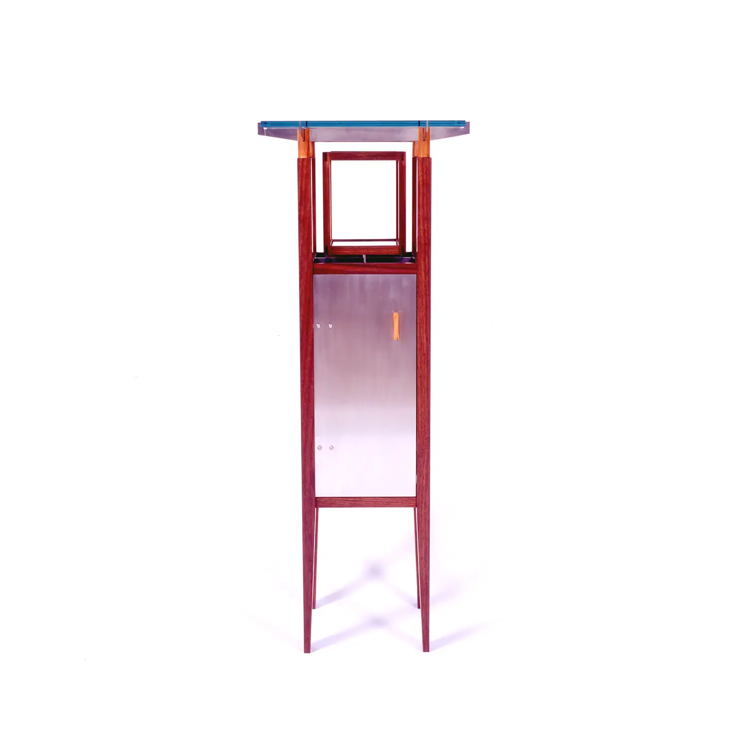 Front view of the Isan Table showing its open wooden structure and contrasting cabinet