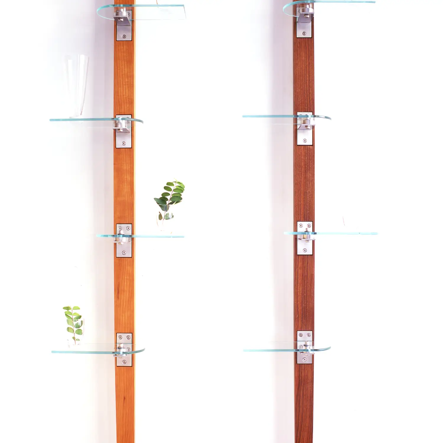 Miru Ichi architectural display shelves arranged along two slender wooden vertical supports