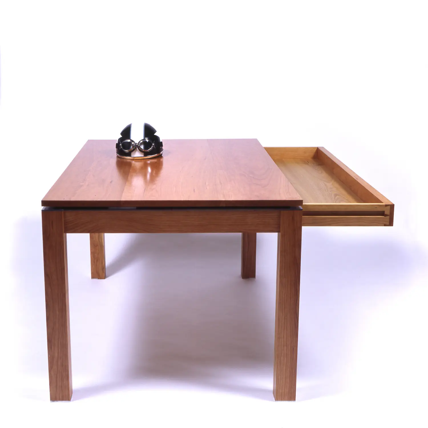 Simple Desk One end view showing the wooden frame and elevated work surface